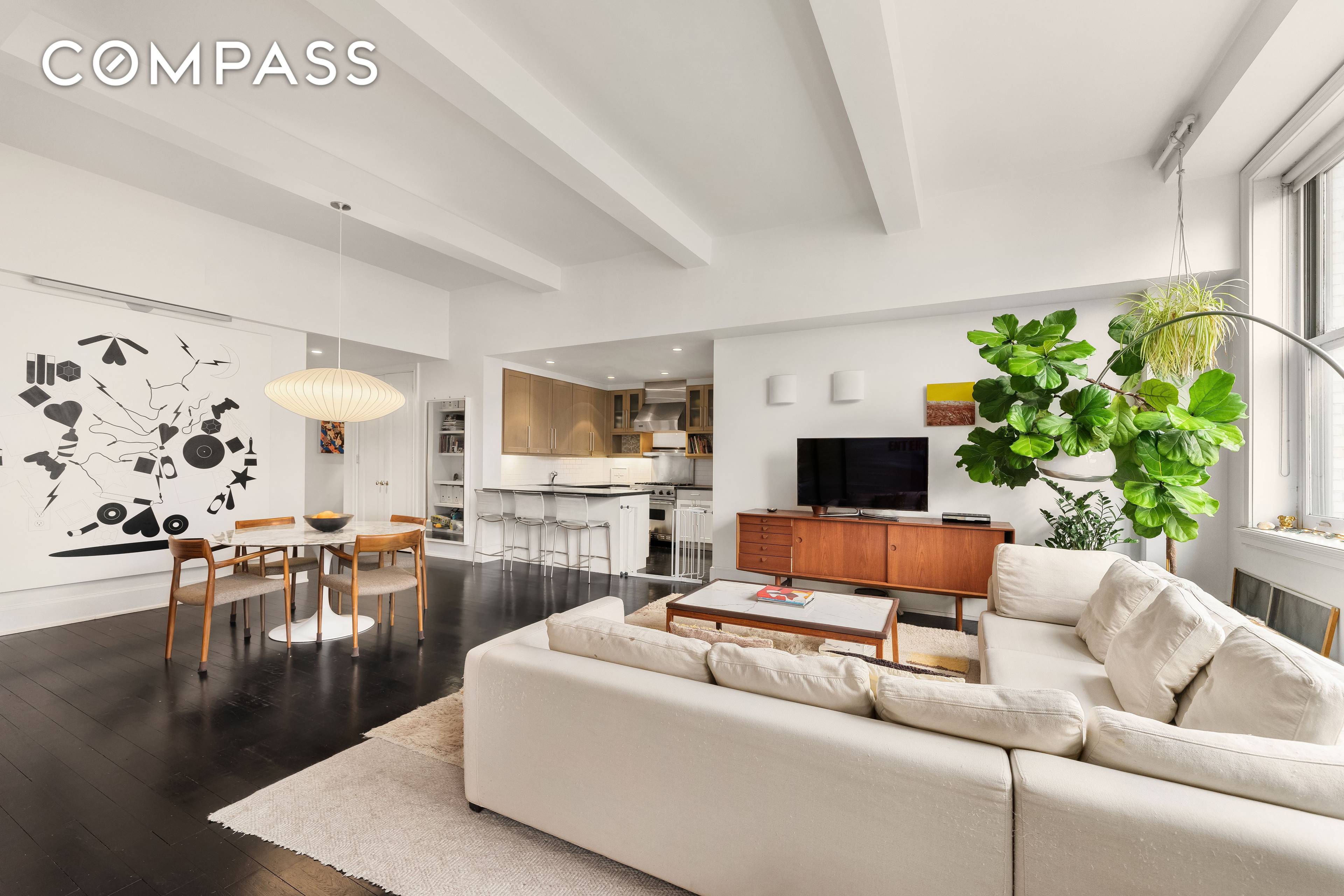 Enter this stunning renovated apartment through a key locked elevator directly into the oversized living and dining area.
