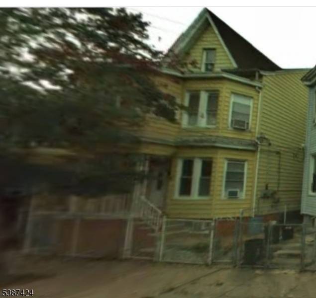 large 2 family with finished attic and finished basement.