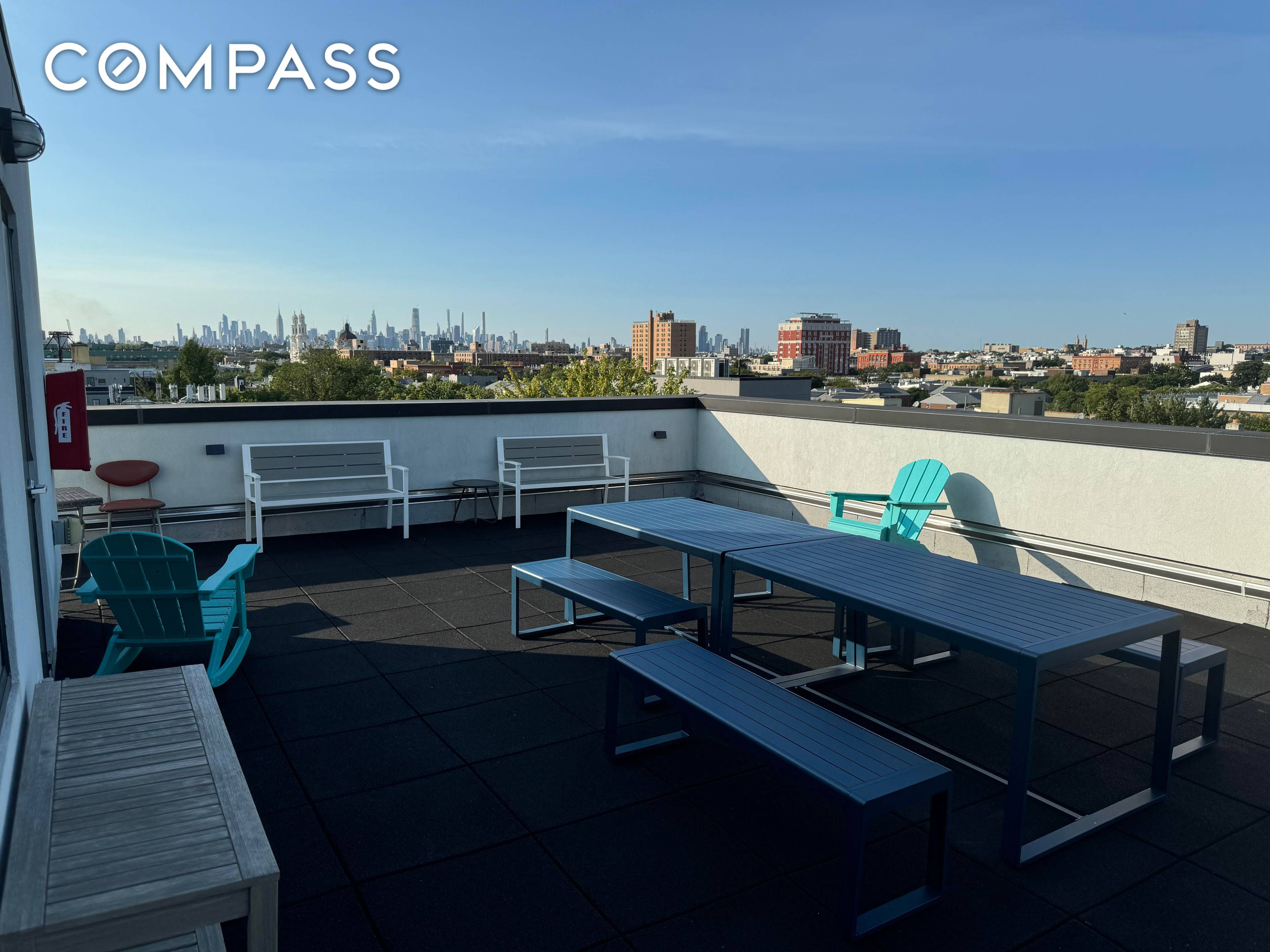 Don't miss this elevator building with a gym and shared rooftop chill area with barbeque.