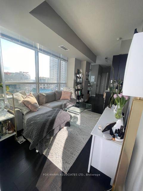 Live bright and bold in this stunning corner suite at LTD Condos in the Fort York neighbourhood.