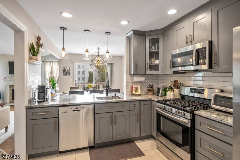 YOU WILL BE WOWED BY ALL THE UPGRADES 2020 2023 IN THIS PRISTINE CONDITION 2 LEVEL 3RD FLOOR UNIT.