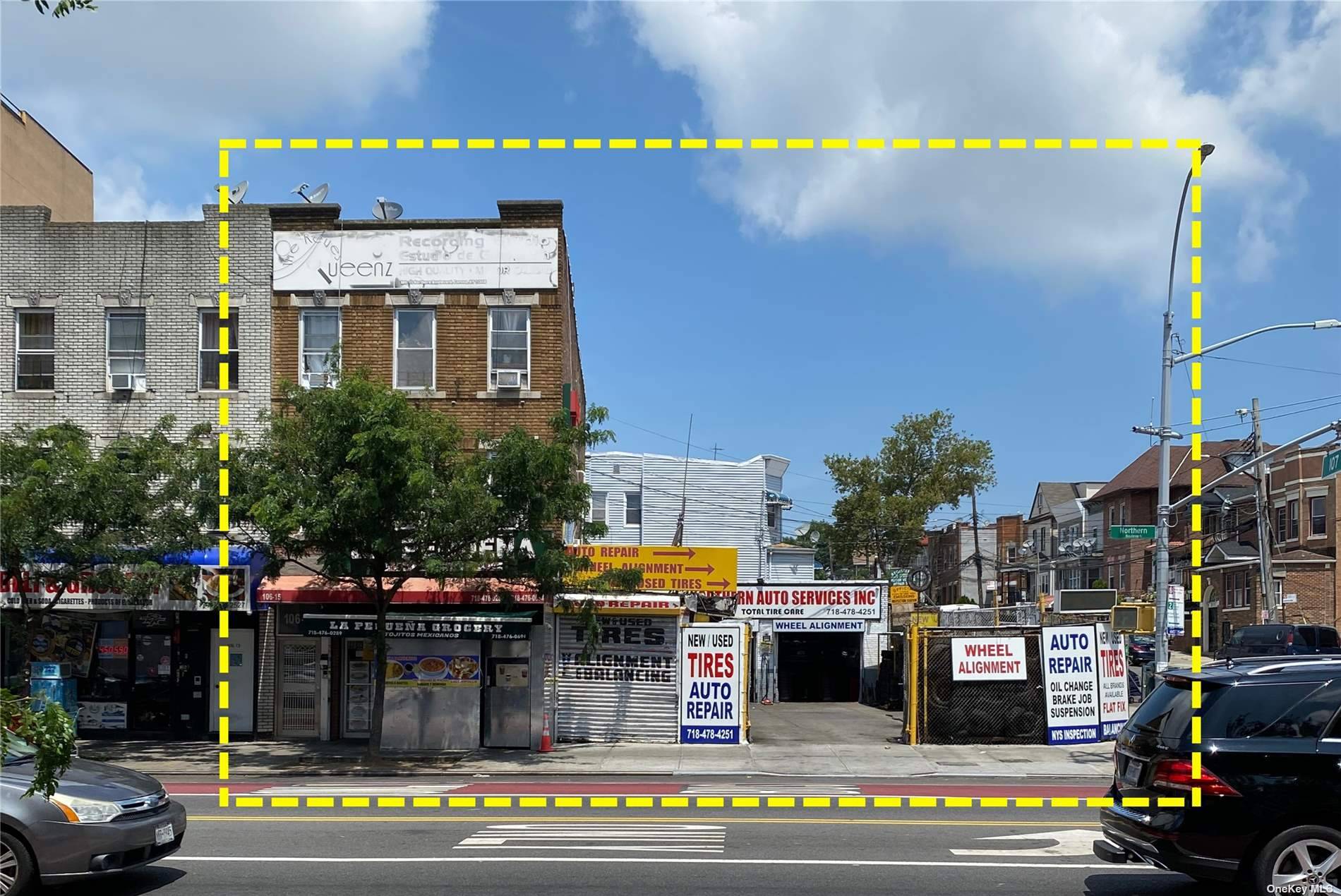 Three story mixed use building with an adjacent tire shop situated on a corner lot with a lot size of 5, 500 SF.