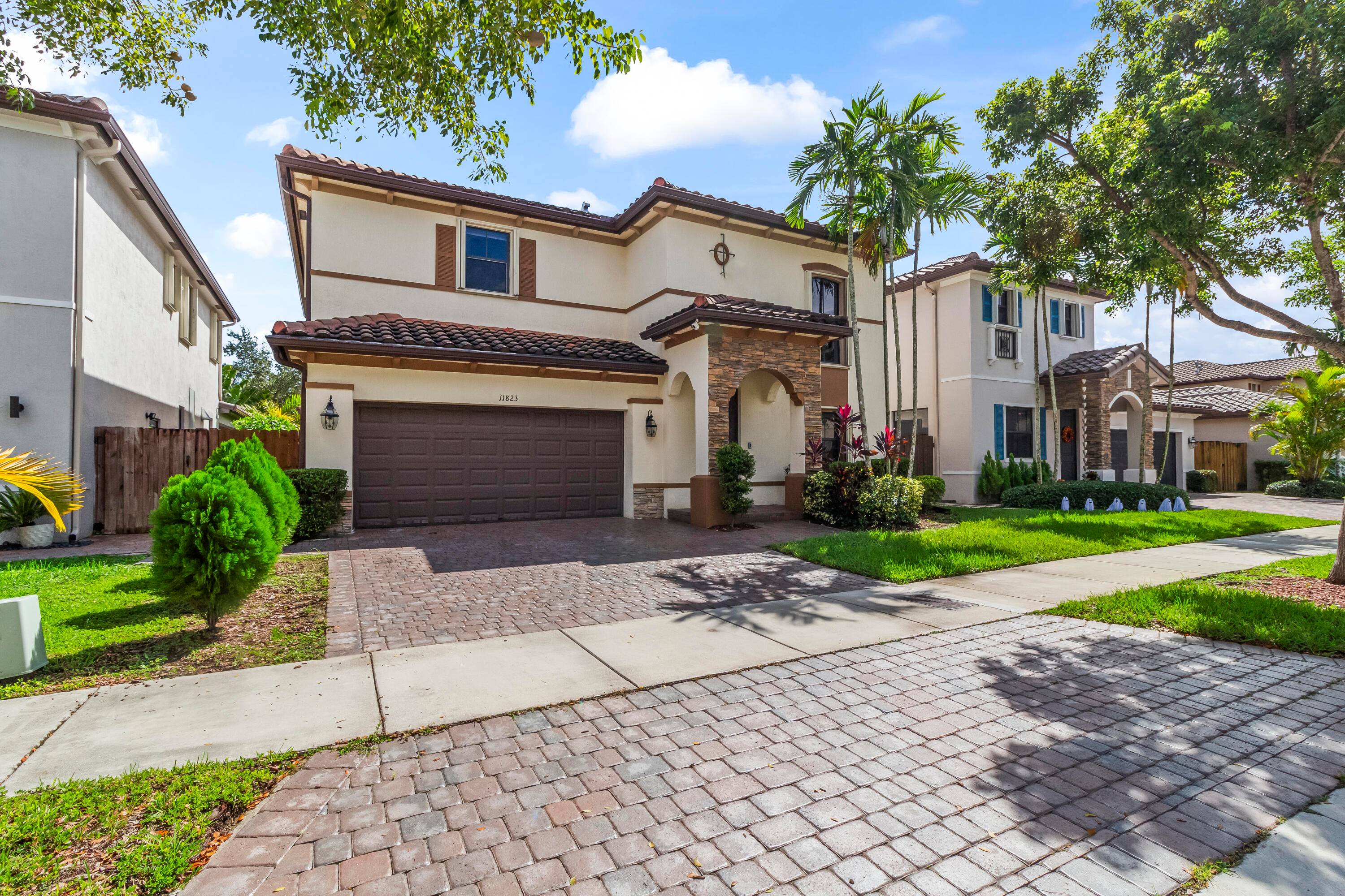 Exquisite Mediterranean Home in Prestigious Garden Estates at The Hammocks.