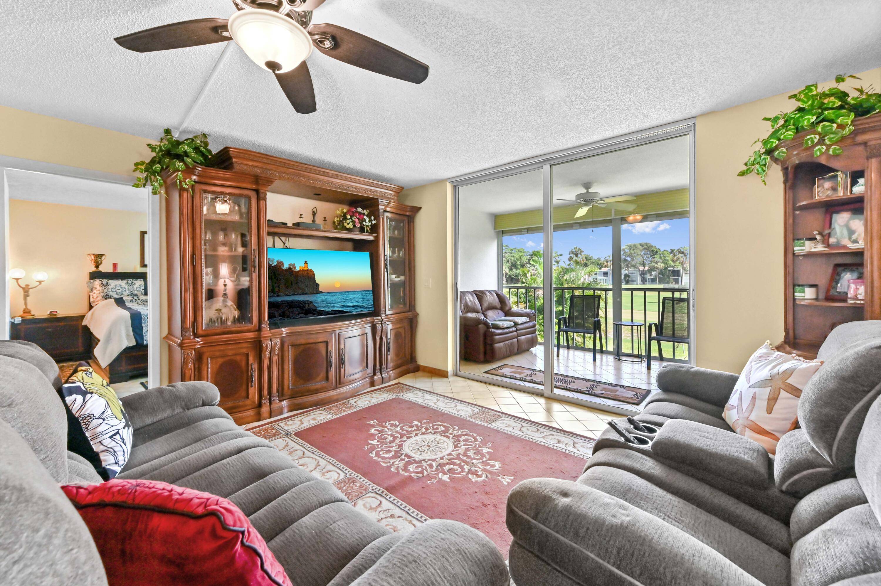 Discover this bright and beautifully maintained 2 bedroom, 2 bath waterfront condo in the sought after community of Palm Springs 2 in Margate.