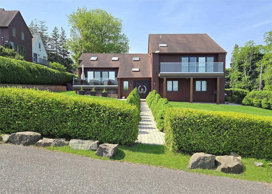 Magnificent Updated Contemporary Home That overlooks the Long Island Sound amp ; has Access to the Beach, Features 4 Bedrooms And 2.