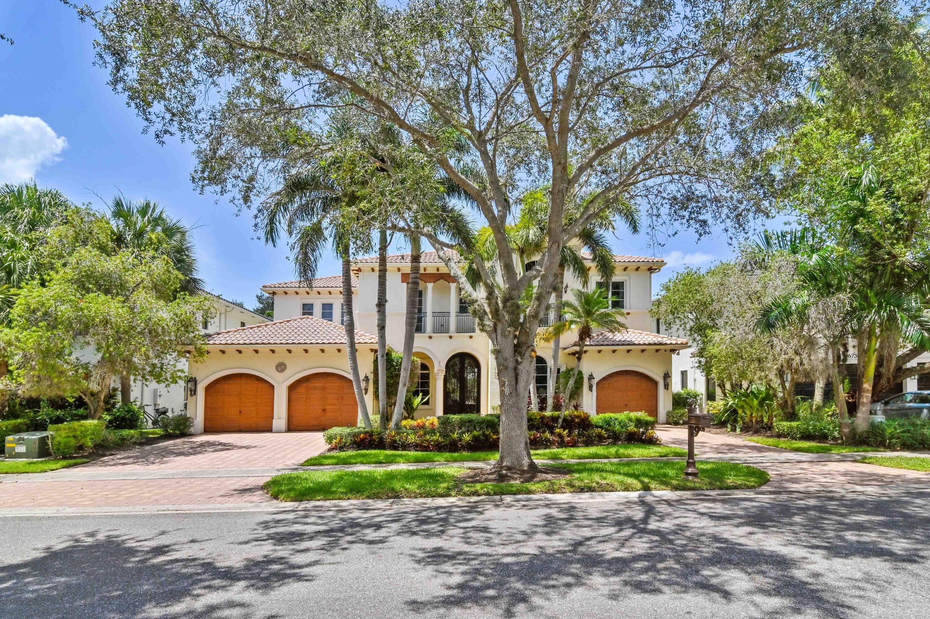 This colossal Mediterranean estate is a unique gem of the prestigious Oaks Country Club.