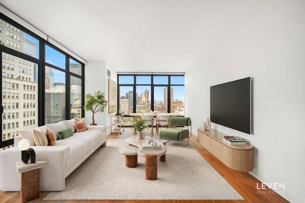 LARGE CORNER STUDIO WITH ADDITIONAL HOME OFFICE SPACE, STORAGE UNIT INCLUDEDIn the Reade57 condominium enjoy an excellent 712sf layout, impressive South Western views to the river and Freedom Tower, beautiful ...