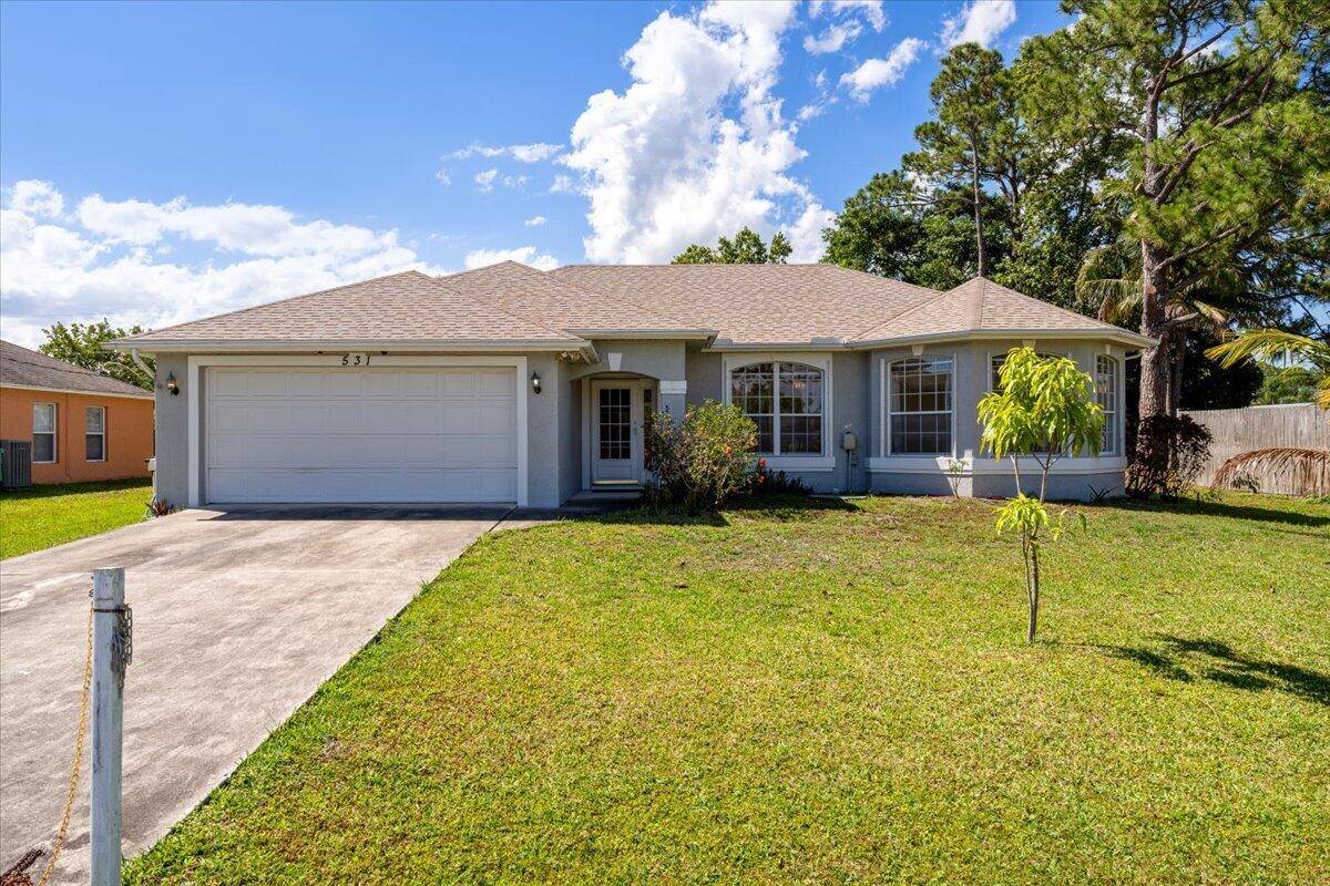 Located in central Port St Lucie, this 3 bedroom, 2 bathroom home is ready and waiting for its next owner to add their personal touch and make it their own.