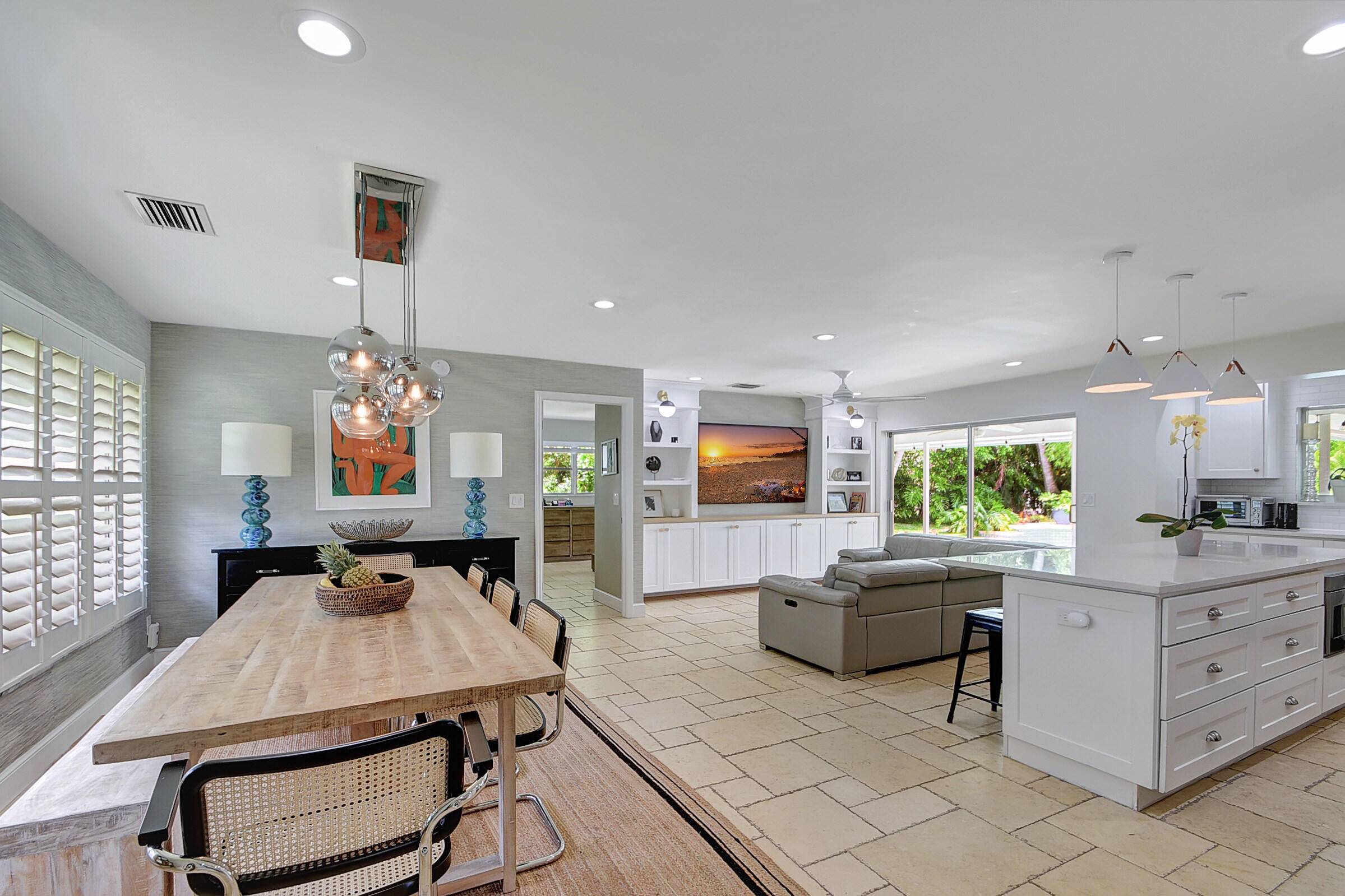 Welcome to this stunning, fully remodeled single family home nestled w in the prestigious non equity golf course community of Atlantis.