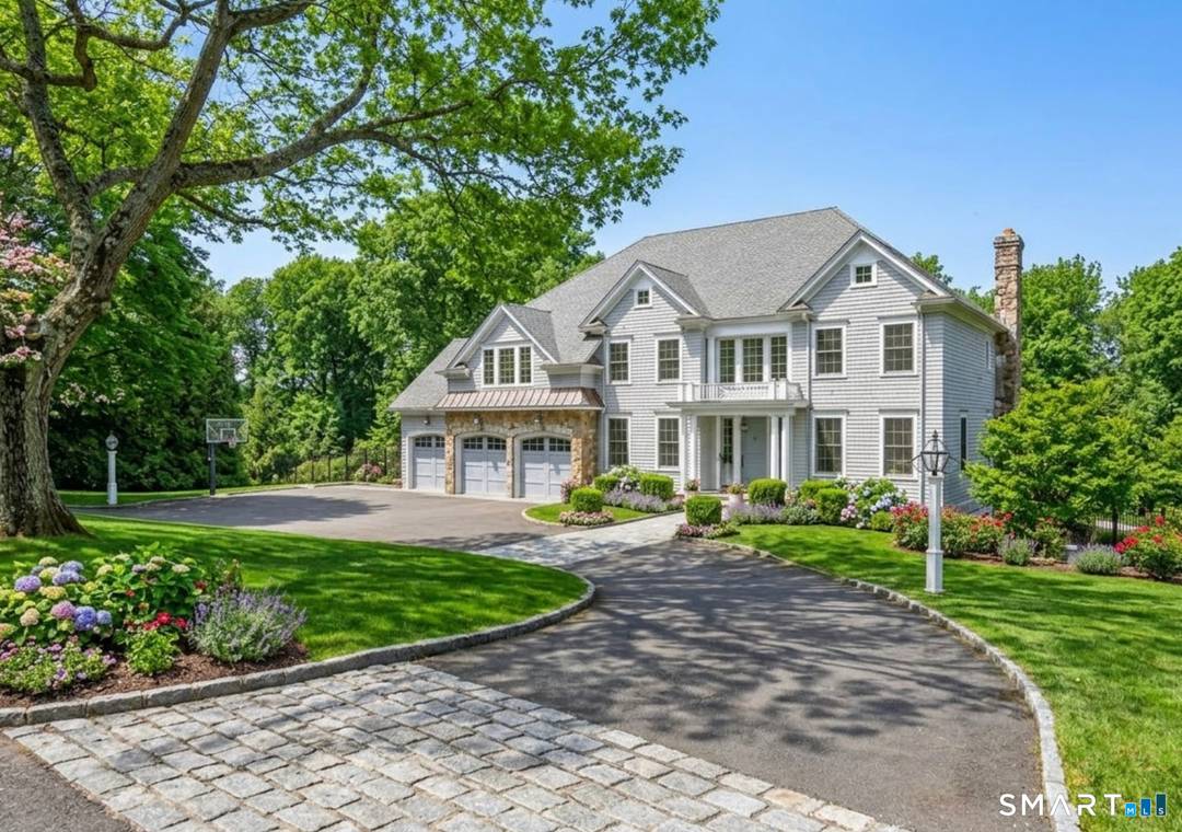 Welcome to this exceptional newer Colonial nestled in a highly desirable Southport location, where timeless elegance meets modern luxury.