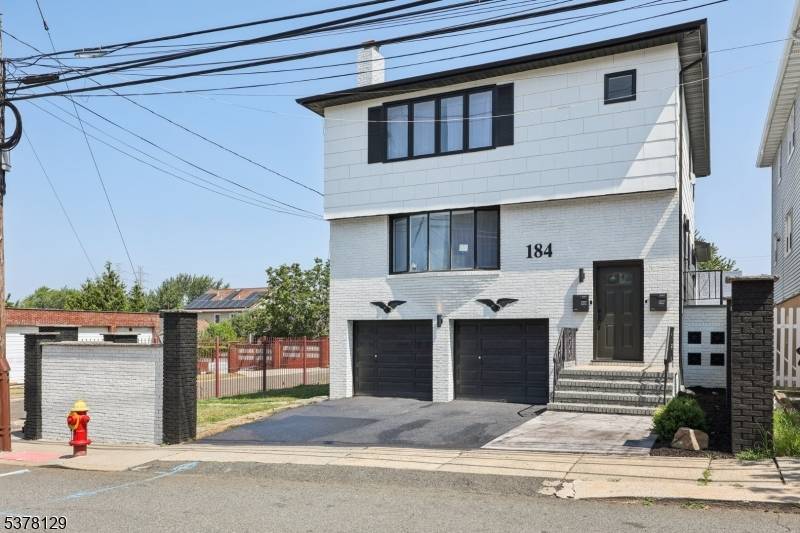 Amazing Opportunity ! Discover this massive, fully renovated two family home offering exceptional space and versatility.