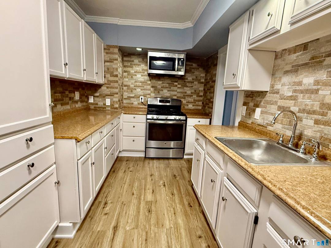 Beautiful, Newly Painted 2 Family Home in the Desirable Cove Neighborhood.