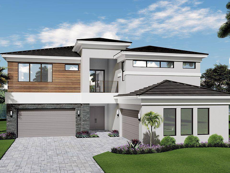 This contemporary single family home features 5 bedrooms, 5 bathrooms, plus a loft and den, along with a 4 car garage.