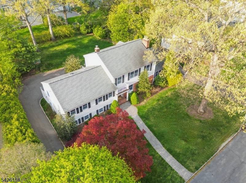 FABULOUS SHORT HILLS HOME MODERN LIVING AT ITS FINEST Nestled on a quiet street in one of Short Hills' most desirable neighborhoods, this beautifully updated home offers refined living with ...