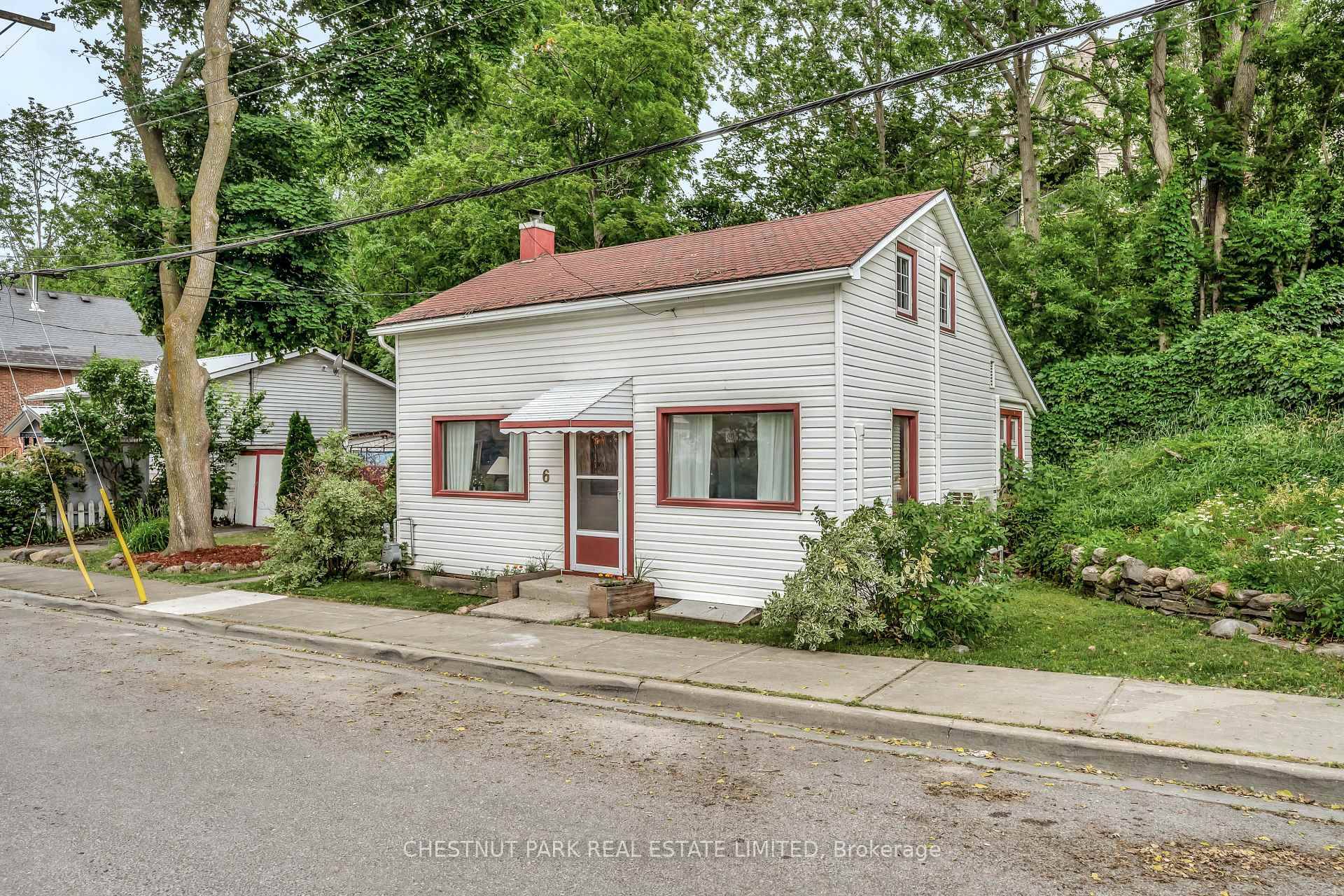 Century charm and character radiate from this thoughtfully updated 1840s 1 1 2 story home in the heart of Picton.