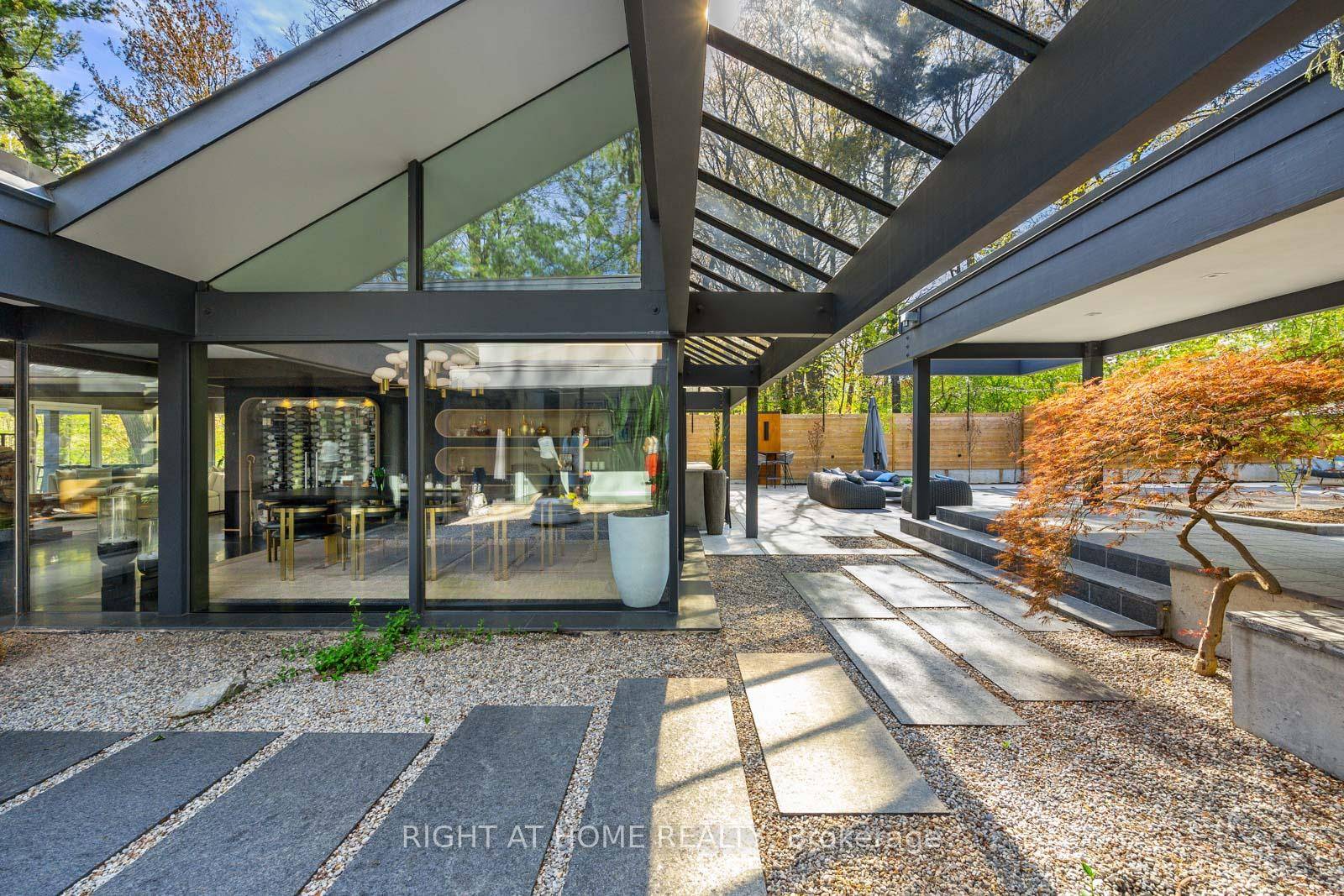 A FRANK LLOYD WRIGHT INSPIRED MASTERPIECE is a once in a lifetime opportunity in Humbervalley Kingsway's most prestigious enclave.