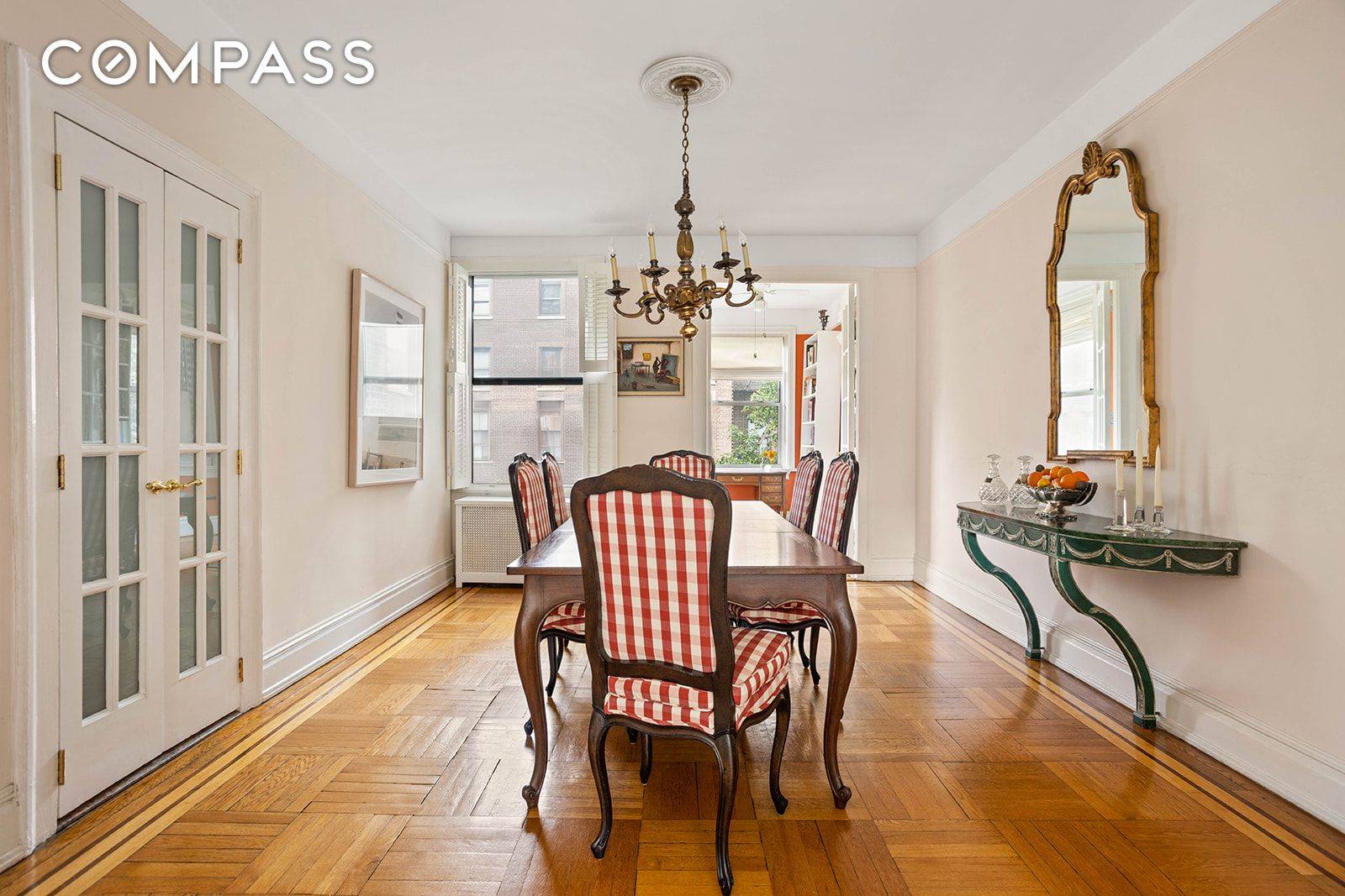 An elegant pre war aesthetic lives comfortably alongside modern renovations in this six room co op in the sought after historic district of Jackson Heights.