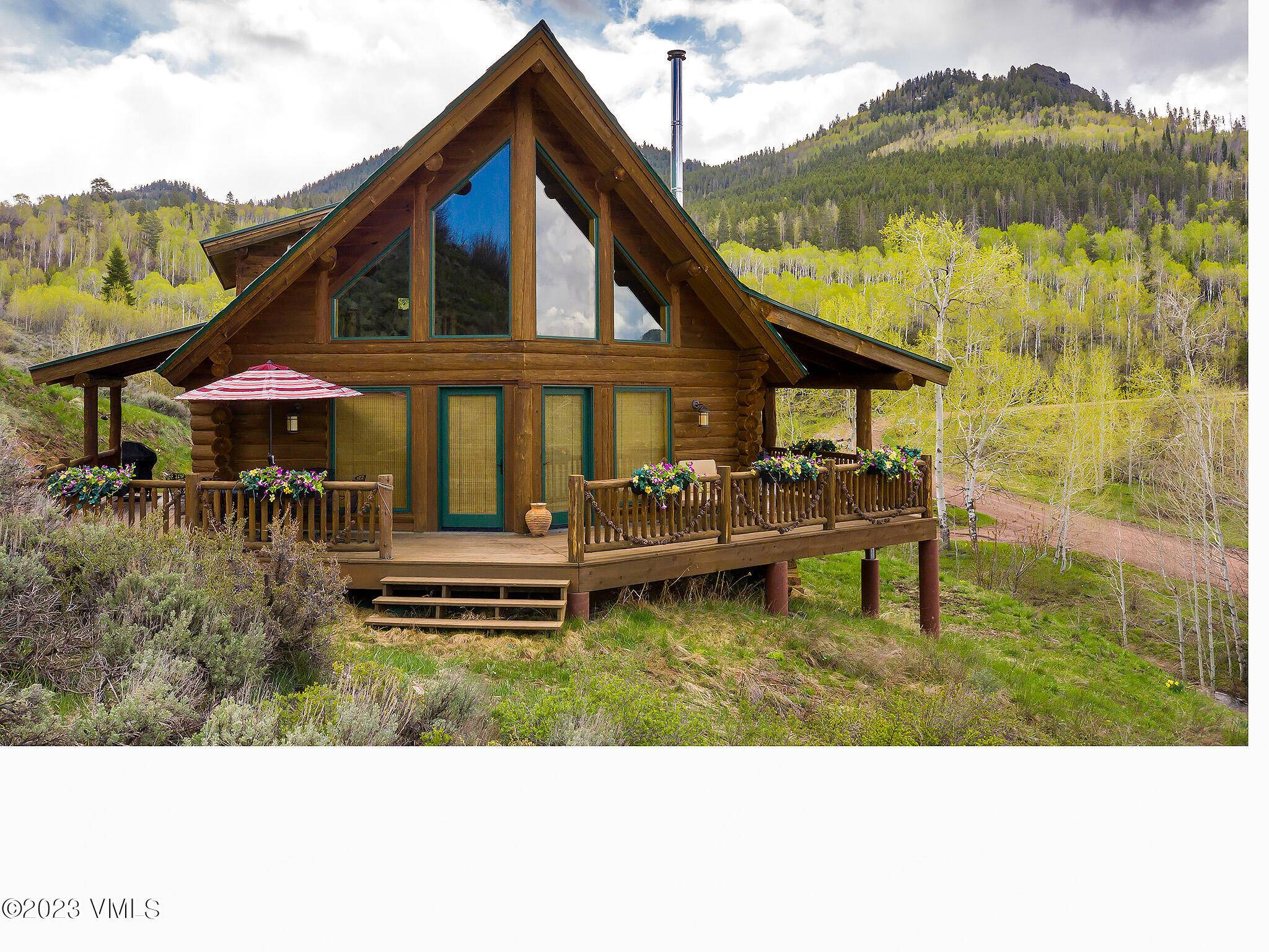 Luxurious mountain living in this extraordinary log cabin nestled in the breathtaking surroundings of Stagecoach reservoir, Colorado.