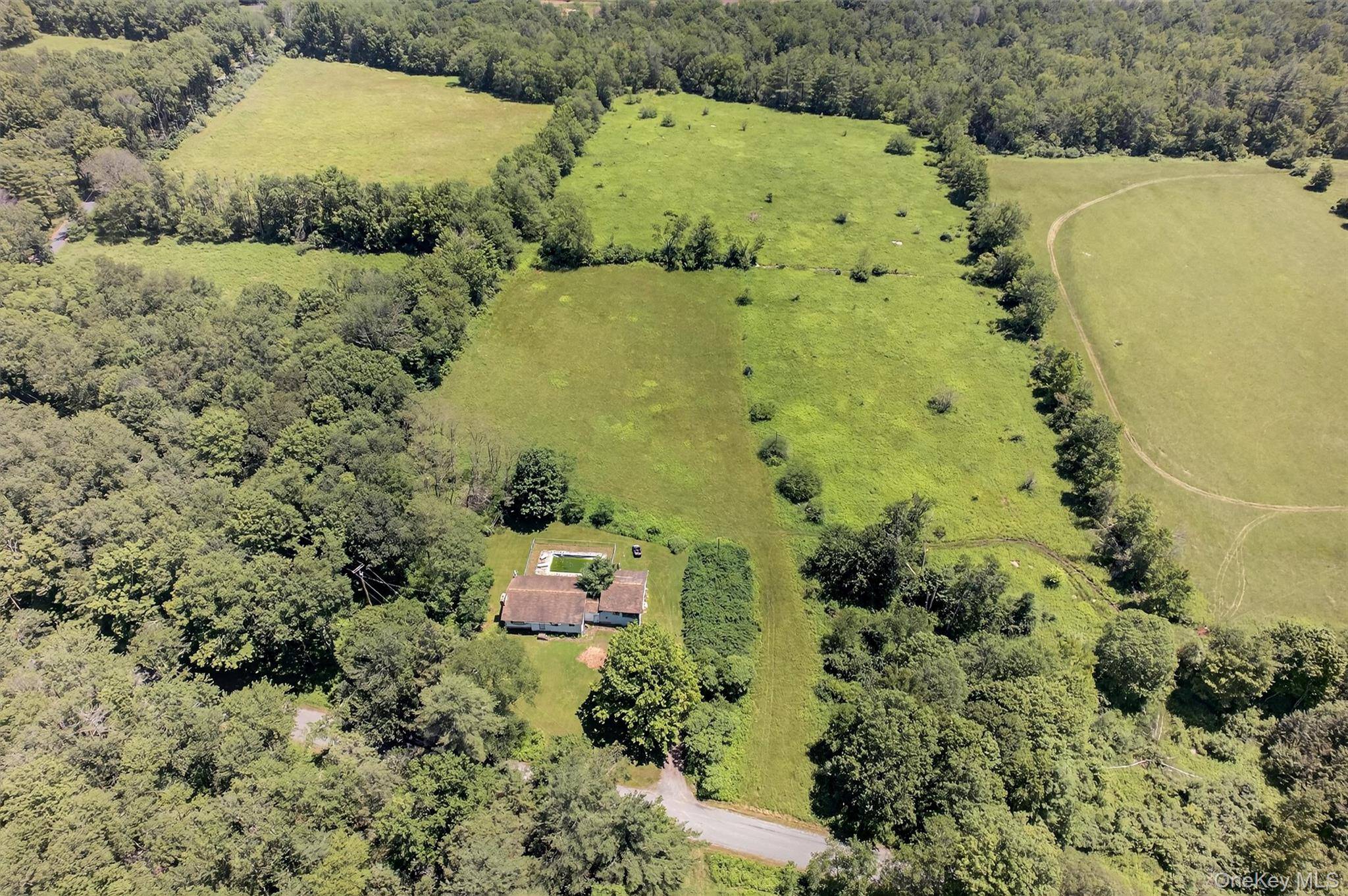 14 Beautiful Acres on Quiet Country Road Ideal for Horses, Farming, or Your Private Retreat.