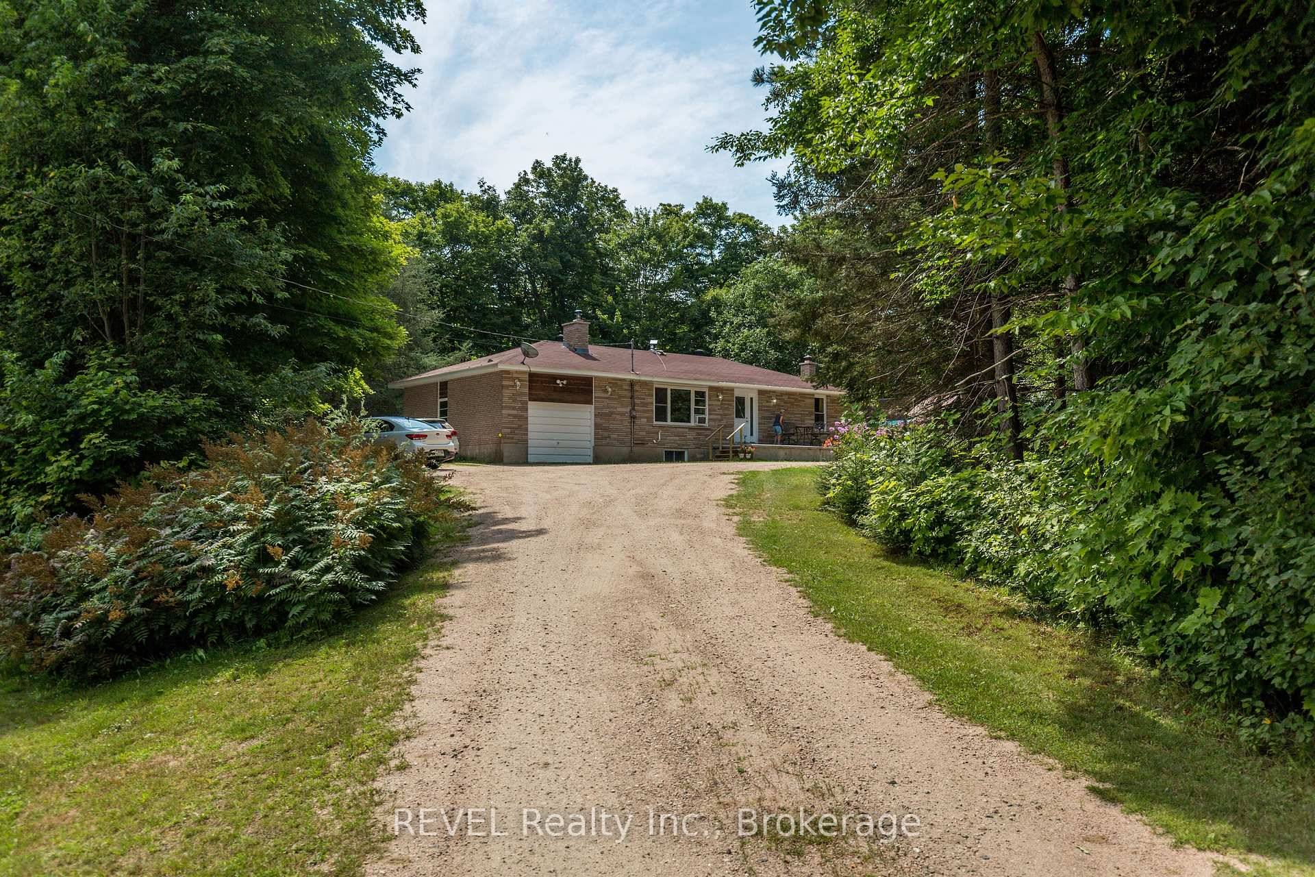 This beautiful and private, 20 acre, is heavily treed, with a Maple Bush, a meadow, pond, trails, a 1062 sq ft bungalow plus a walkout basement, outer buildings, may be ...