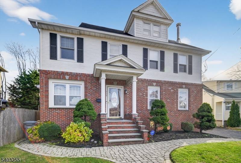 This Classic Brick front Colonial has been beautifully updated and expanded with a generous addition, offering 4 Bedrooms, 2.