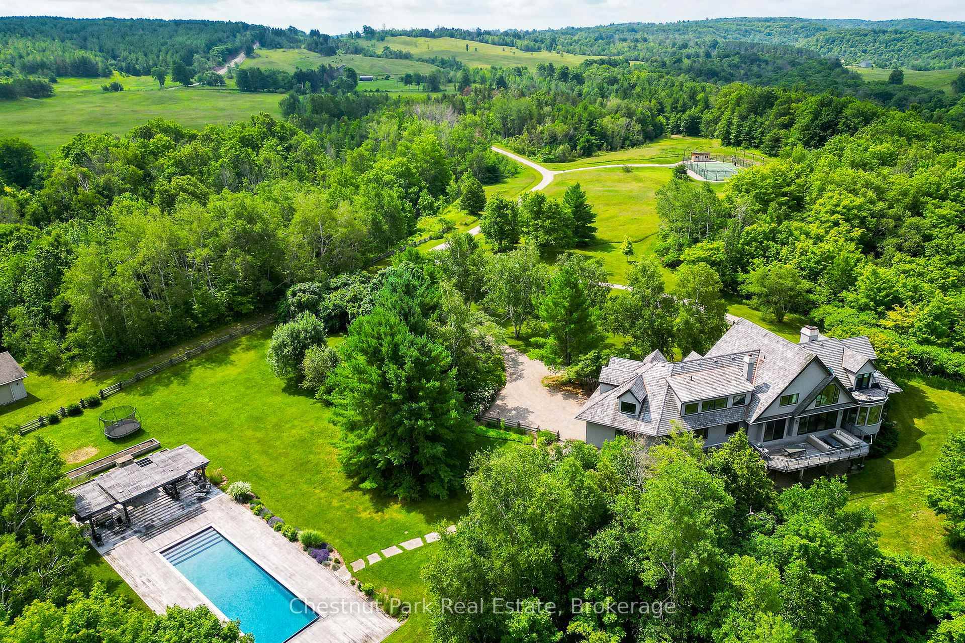 A truly rare offering in the heart of Mulmurs rolling hills 159 acres of absolute privacy, breathtaking views, and unspoiled natural beauty on the Niagara Escarpment.