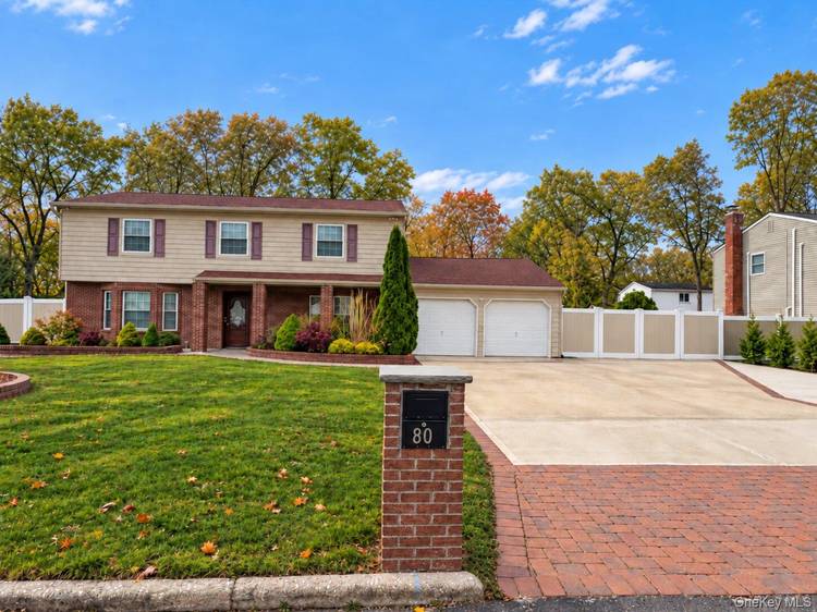 Welcome to this stunning 5 bedroom, 4 bath Colonial, perfectly situated in the highly sought after Comsewogue School District.