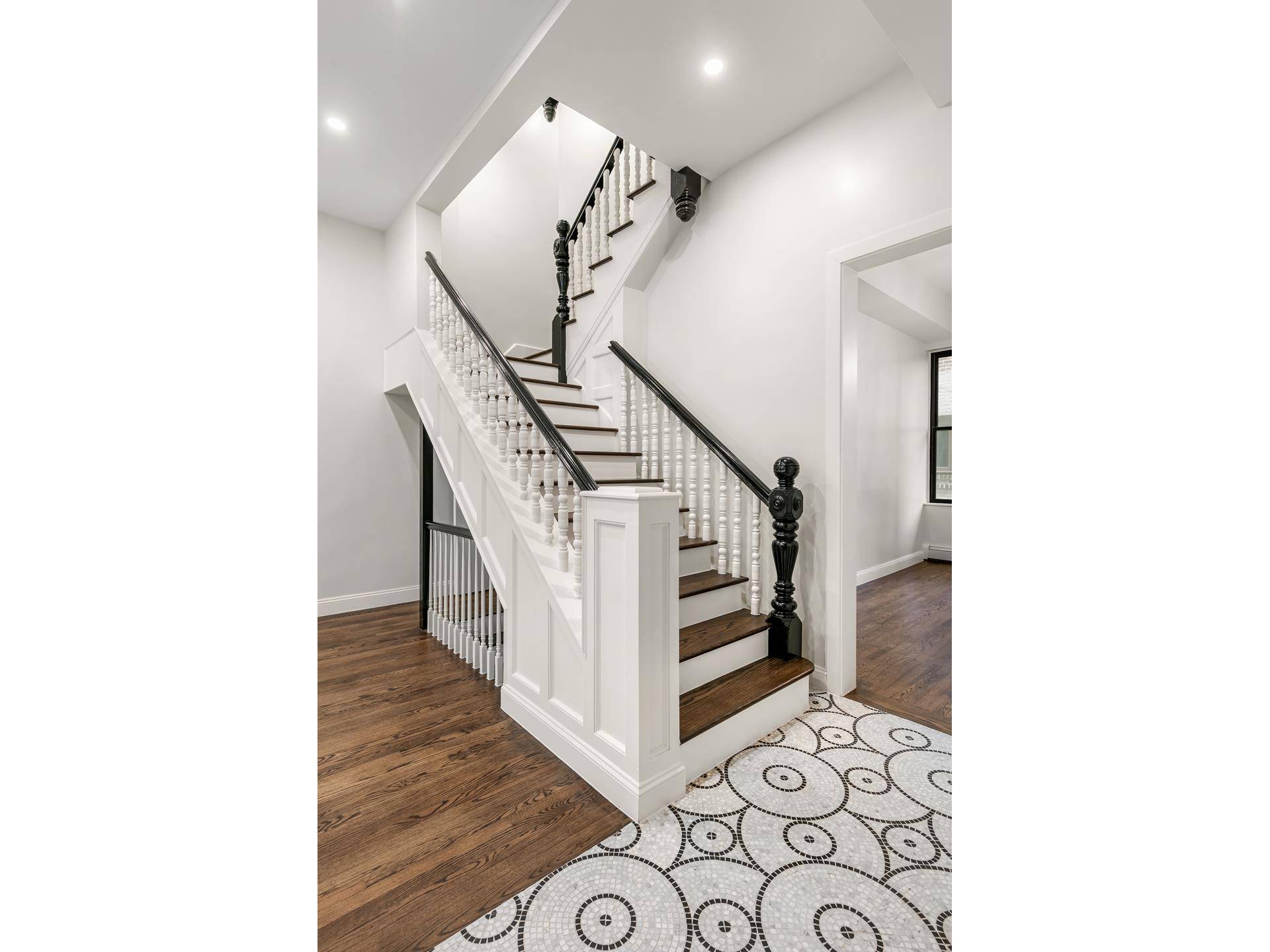This 20 foot wide West End Avenue townhouse is part of an eight home development designed by Frederick B.