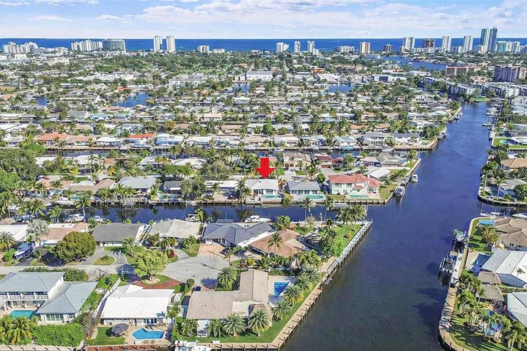This completely renovated, fully furnished turnkey ocean access pool home is located on a quiet cul de sac with 70 feet of water frontage in beautiful Pompano Beach.