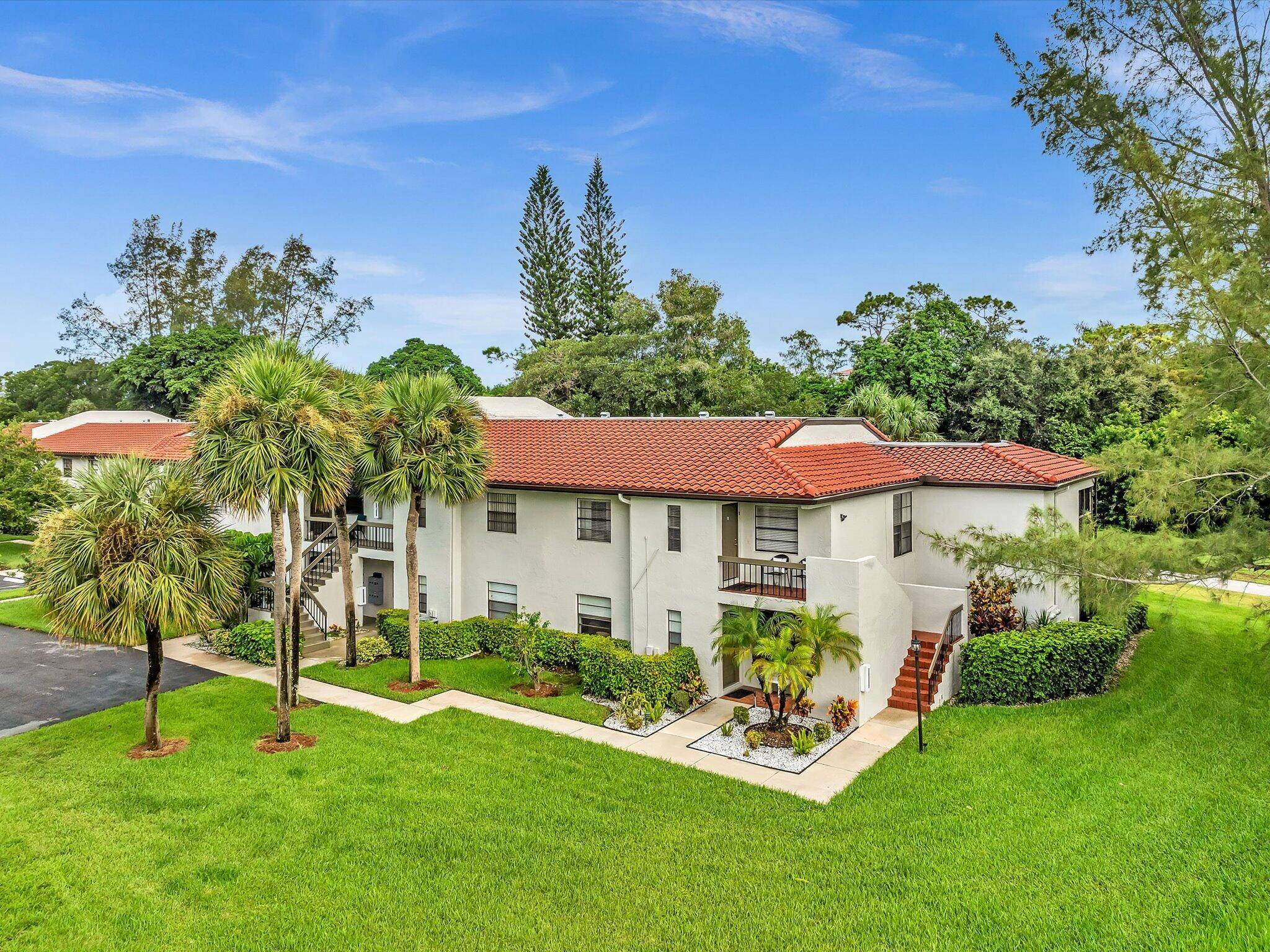 Located alongside the golf course in Boca Lago, this 2nd floor end unit offers a peaceful, extended all weather balcony where you can relax and enjoy the view.