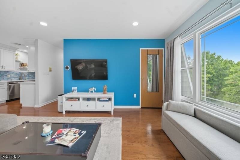 Step into this beautifully reimagined 2 bedroom, 1 bath residence at 253 Park Ave 305.