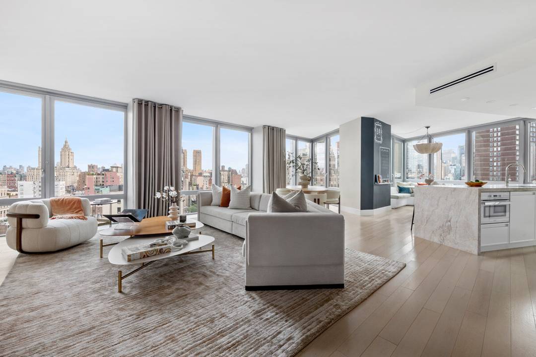 This magnificent, 2, 834 square foot, four bedroom, four and a half bathroom home unveilssweeping Upper West Side views from Central Park to Columbus Circle through south, east, and west ...