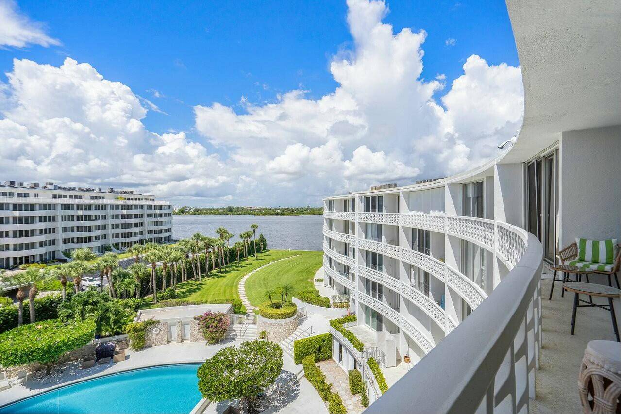 Enjoy stunning sunset views from this split 2 bedroom, 2 bath penthouse apartment at the landmark Regency of Palm Beach, designed by noted architect Gene Lawrence.