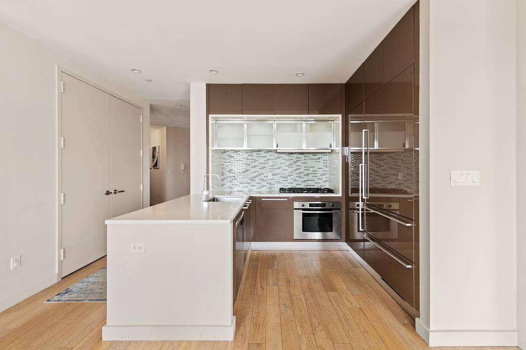 This standout two bedroom plus home office sits high above the East River with unobstructed North amp ; East facing views of Brooklyn, the river, and Lower Manhattan.