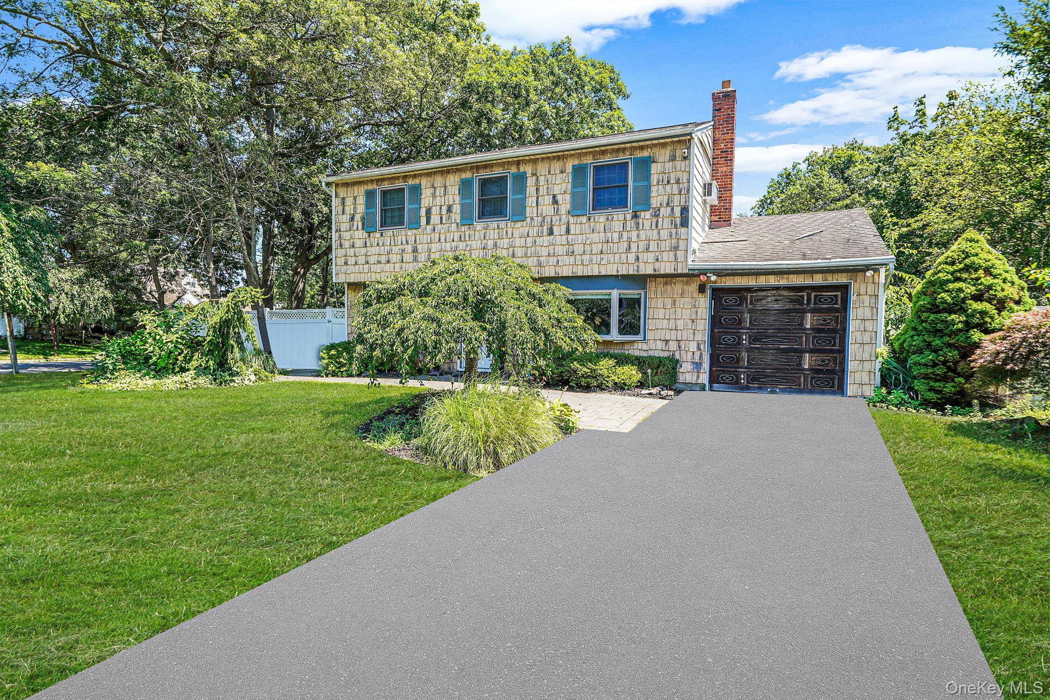 Discover this charming 3 bedroom Colonial nestled in a peaceful cul de sac.