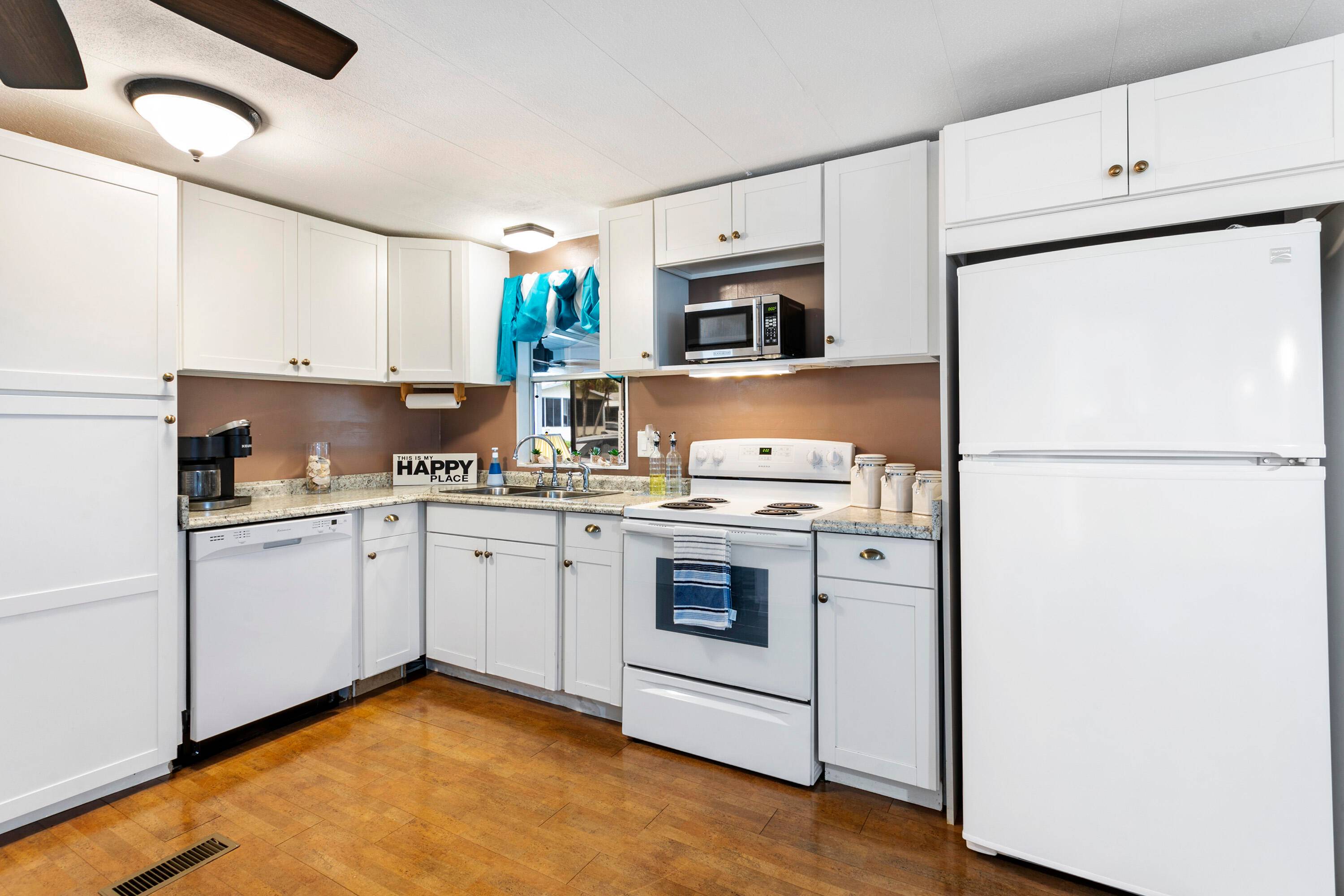 NO Land Lease, Meticulously maintained 2 bedroom 2 bathroom FURNISHED home in desirable Gated 55 Community.