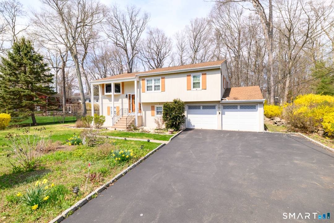 Welcome to 43 Hidden Brook Drive, a warm and inviting 5 bedroom, 2 bath single family home offering versatile two level living perfect for extended families or those seeking flexible ...