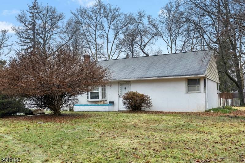 Opportunity awaits with this charming 2 bedroom, 1 bath ranch set on a spacious half acre lot.