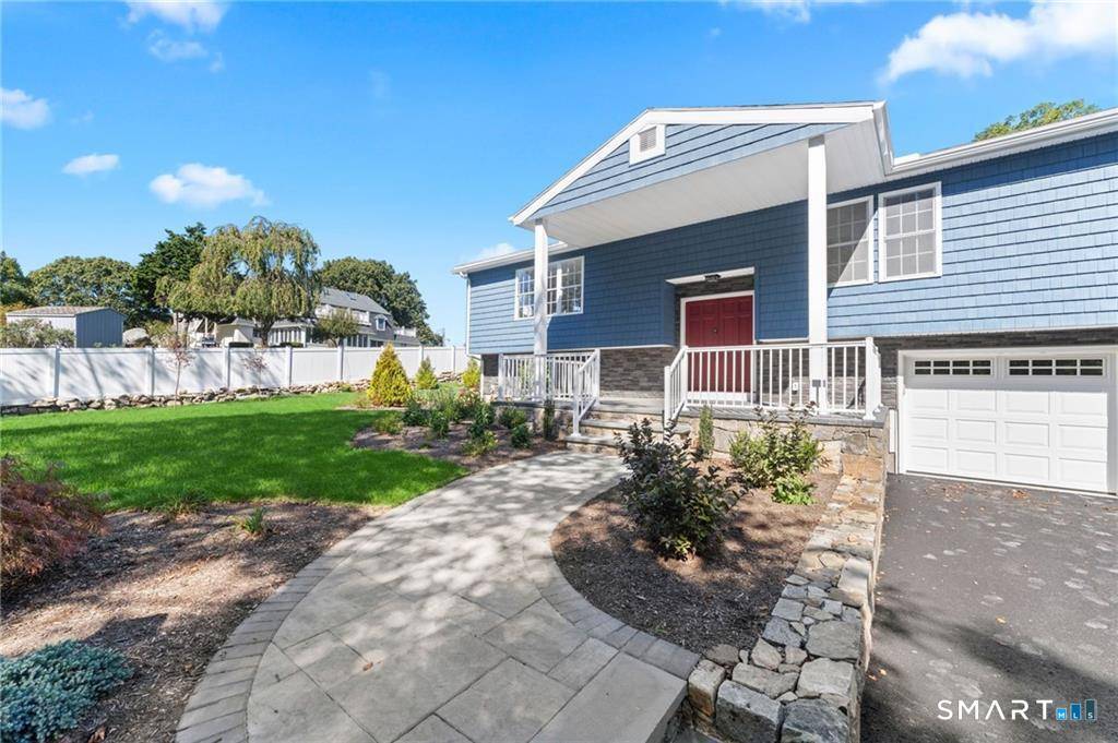 Turnkey coastal living just minutes from Watch Hill, offering a rare opportunity for the space, privacy, and ease that typical beach homes can't.