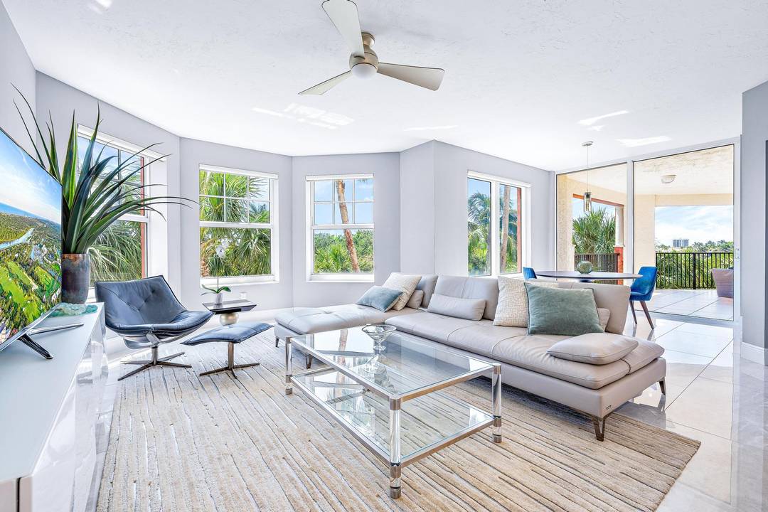 Completely renovated in 2021, this corner unit at Jupiter Yacht Club offers a refined, comfortable lifestyle on the Intracoastal.