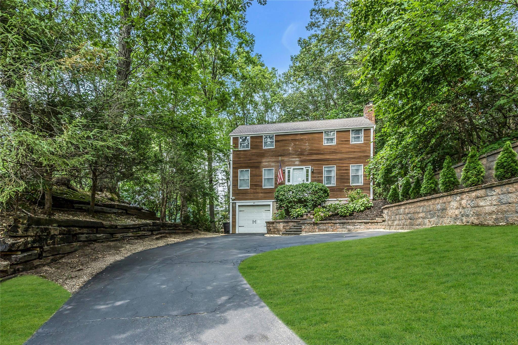 Welcome to this stunning Colonial residence, nestled in a peaceful cul de sac that provides the ultimate in privacy.