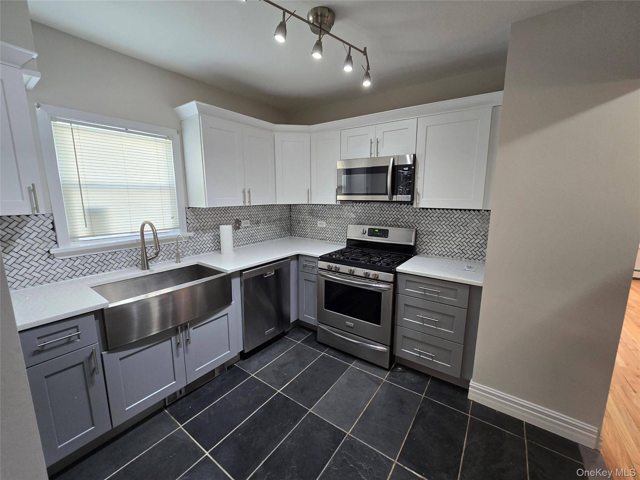 Fully Renovated Whole House In Lakeview Section Of Rockville Centre, New Kitchen With Stainless Steel Appliances.