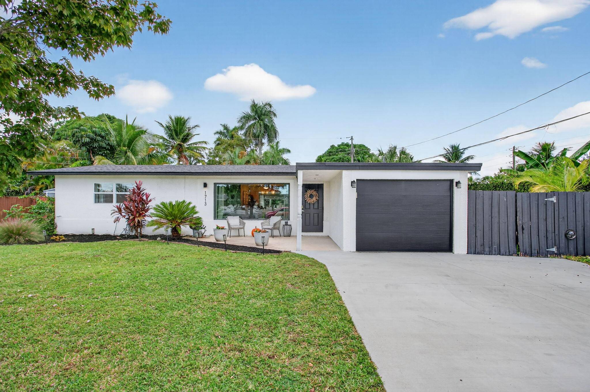 Welcome home to a move in ready South Florida retreat where every detail has been upgraded for comfort, style, and peace of mind !