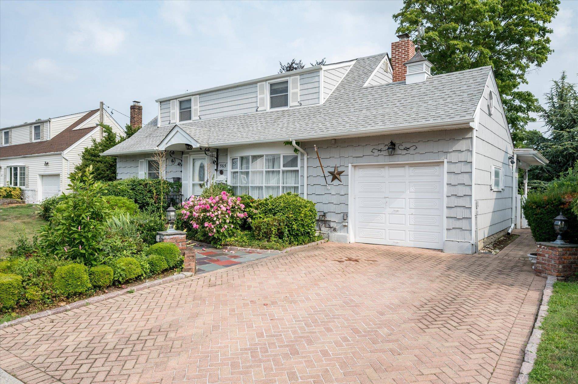 Welcome to this expanded cape full of timeless charm, thoughtful updates, and incredible craftsmanship lovingly maintained by generations of master carpenters and electricians.