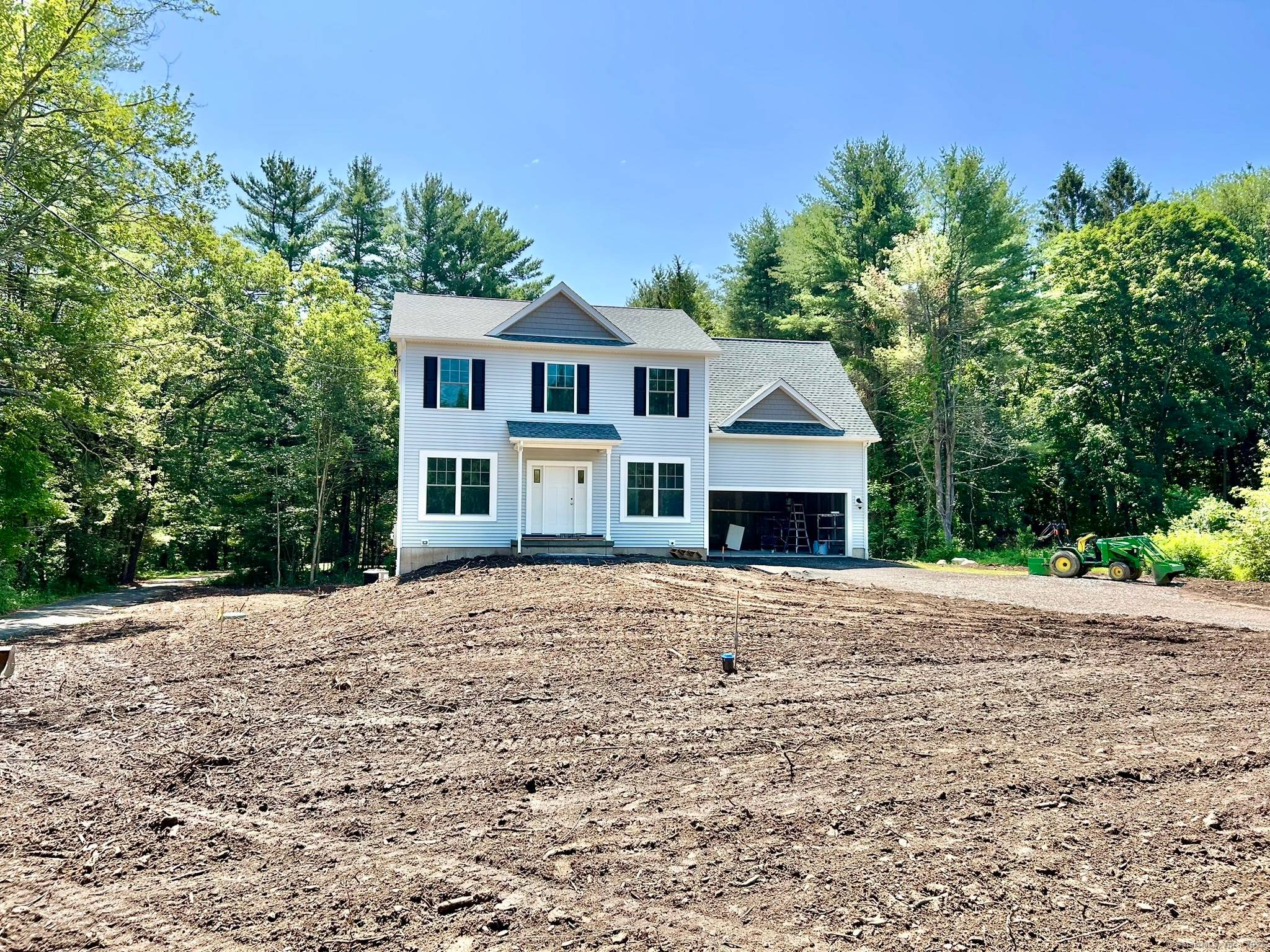 This beautiful new 4 bedroom colonial with IN LAW apartment potential is almost complete and ready for occupancy.