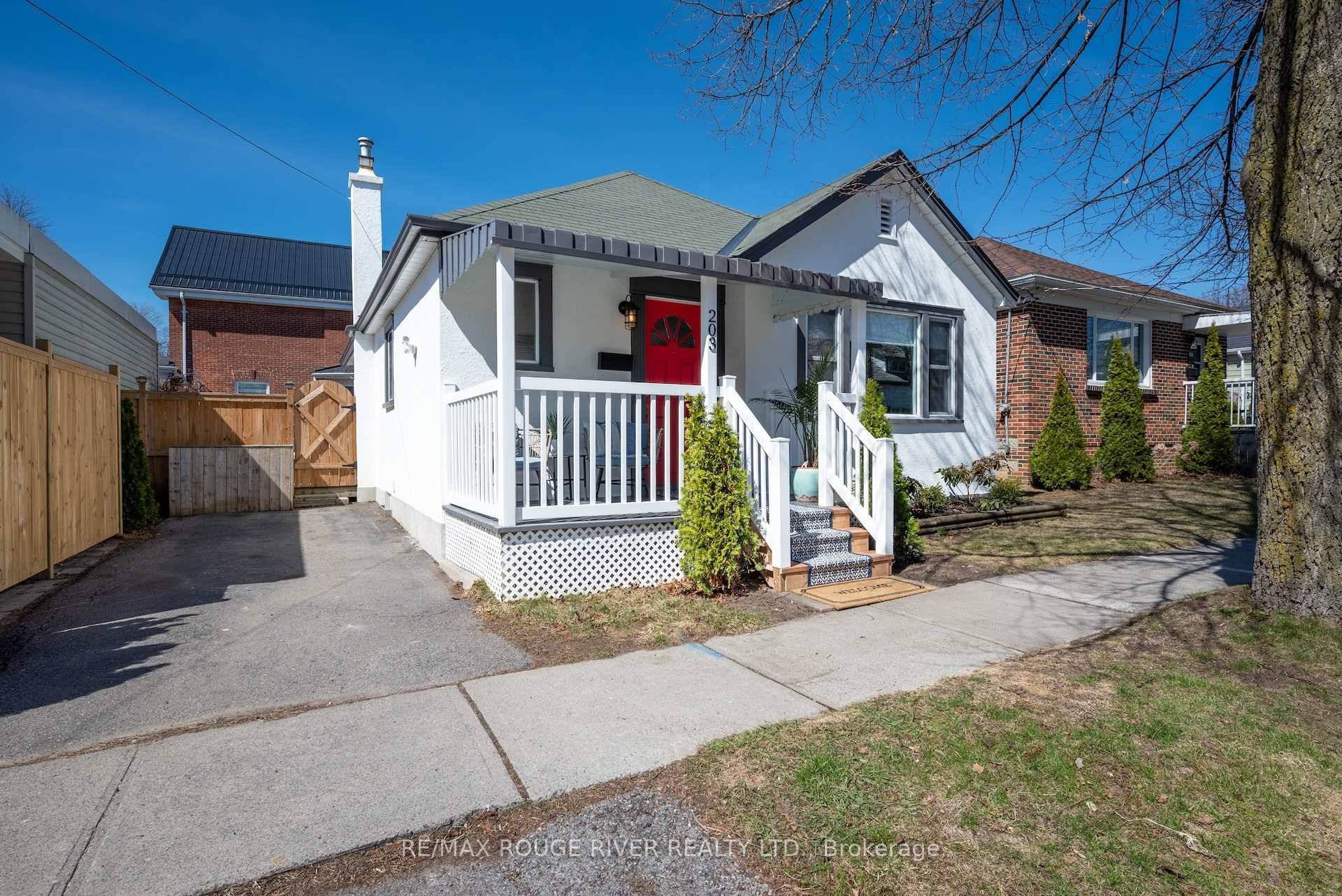This pretty vintage bungalow graces one of Cobourg's most coveted streets, steps from the beach boardwalk at the south end of the street.