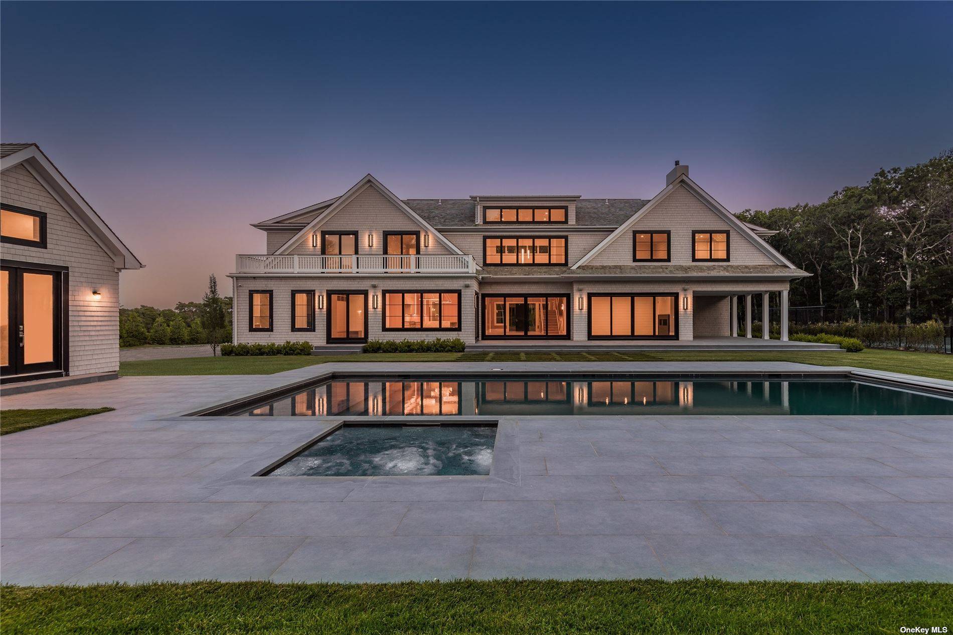Sitting on nearly 5 acres, this new construction is a masterpiece with modern, spacious interiors.