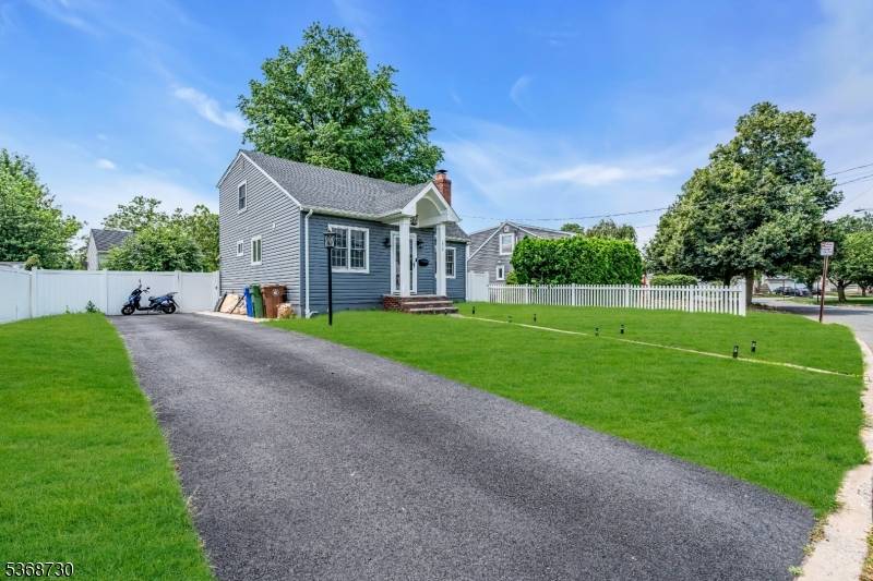 This delightful Cape Cod home is located in the Sunnyside neighborhood of Linden.