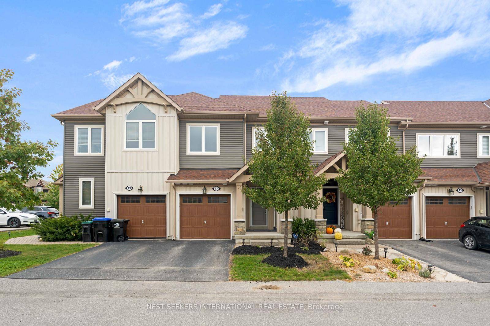 Welcome to 47 Lett Avenue, a beautifully maintained freehold townhome nestled in the sought after Blue Fairway community in Collingwood.