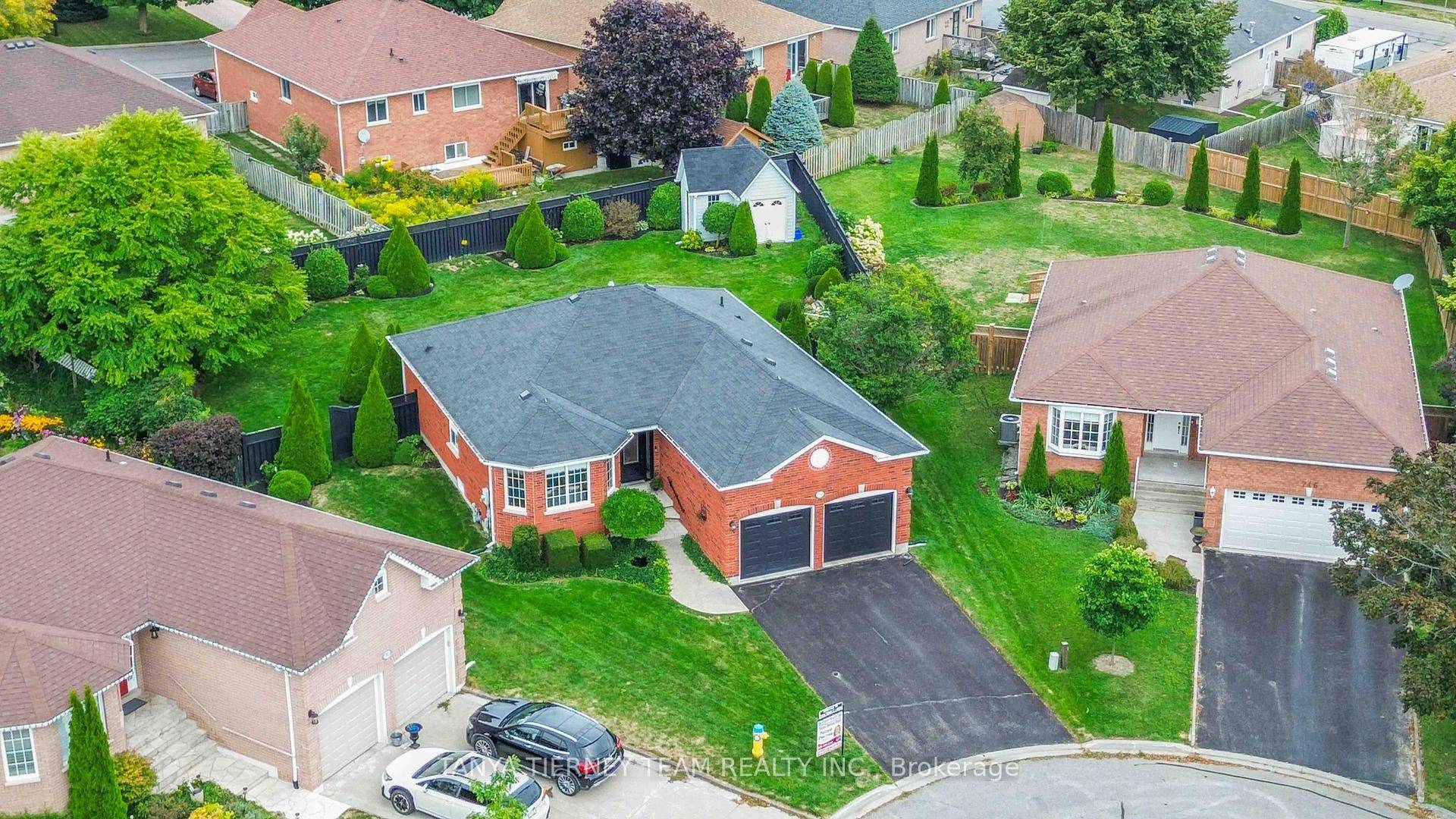Absolutely stunning all brick, bungalow on a peaceful cul de sac, with a large, gorgeously landscaped pie shaped lot.